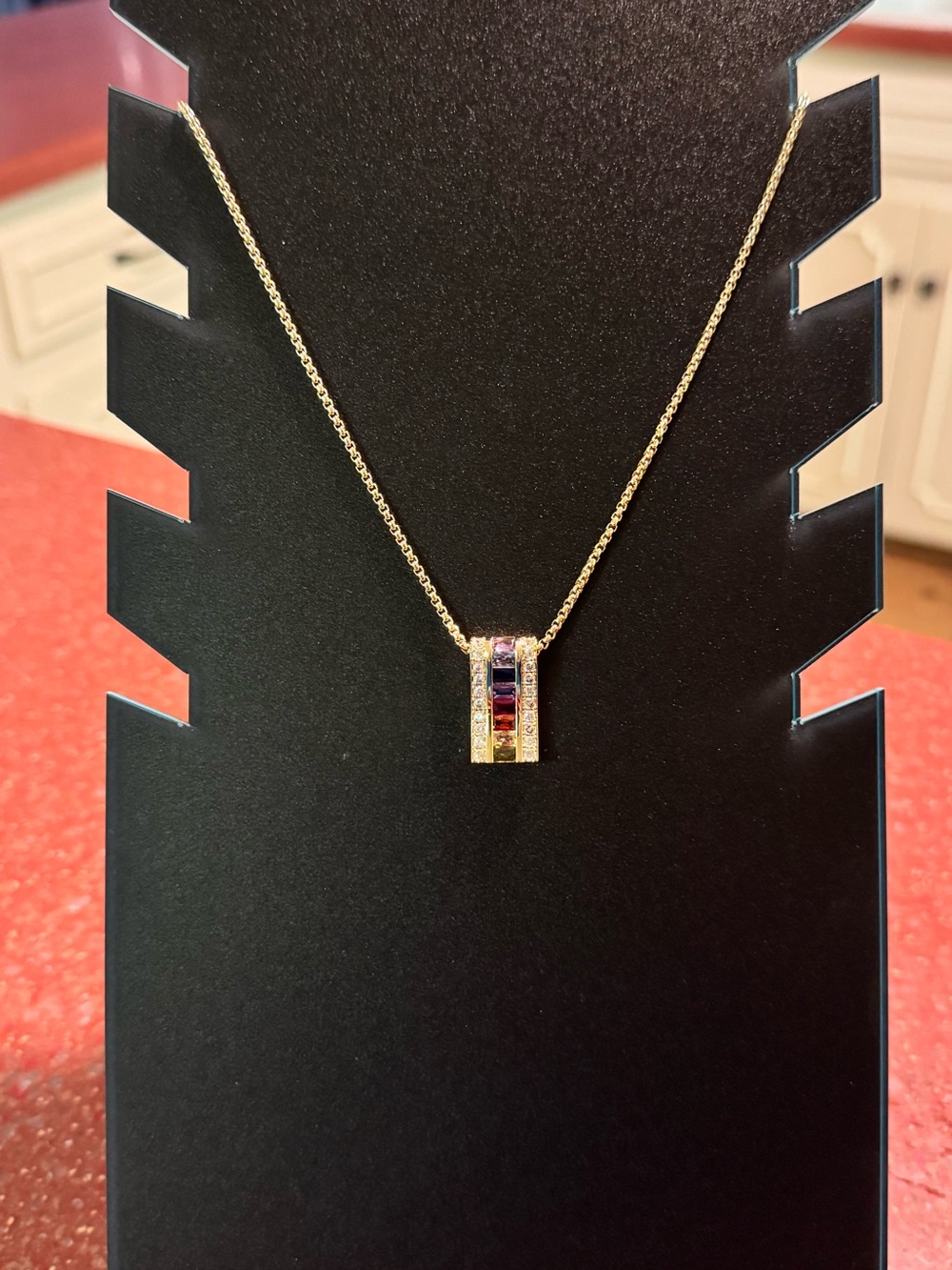 NEW Cubic Zirconia Gold-tone multicolored stone necklace. Claw clasp closure 16”
